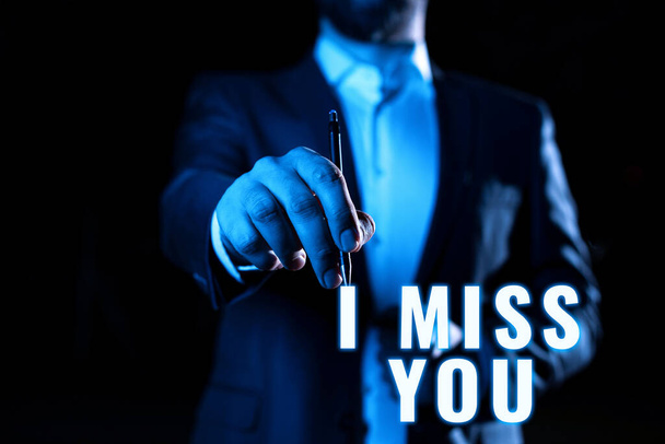 Text caption presenting I Miss You, Internet Concept Feeling sad because you are not here anymore loving message Businessman Pointing Important Informations With Pen In Hand. - Fotó, kép