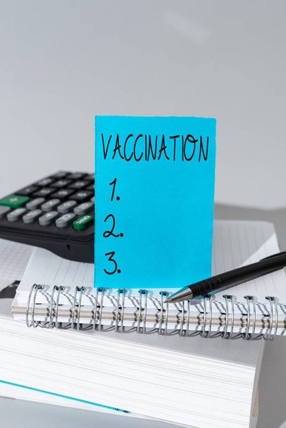 Conceptual display Vaccination, Business approach Treatment which makes the body stronger against infection Important Message Presented On Piece Of Paper On Desk With Keyboard. - Photo, Image