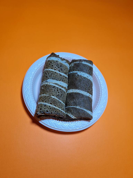 A typical Indonesian snack made from flour and other ingredients called omelet rolls sweet - Фото, зображення