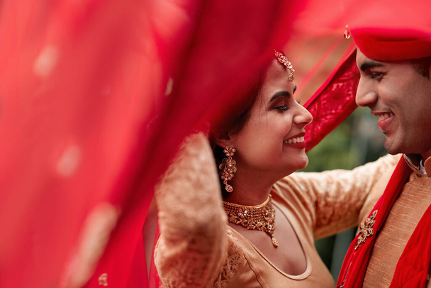 We waited so long for this day. a young hindu couple on their wedding day - Foto, Bild