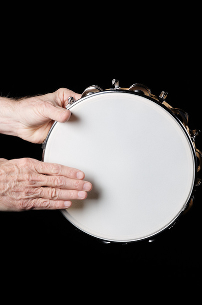 Tambourine and hands Isolated On Black - Photo, Image