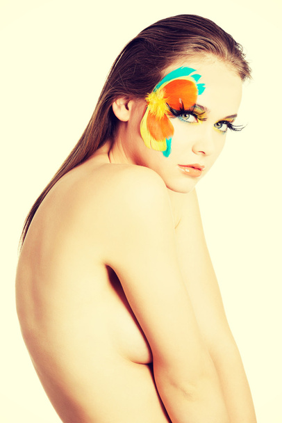 Beautiful woman with abstract make up. - Foto, afbeelding