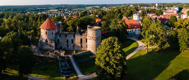 Aerial view of beautiful ruins of ancient Livonian castle in old town of Cesis, Latvia. Located within Gauja national park - Fotografie, Obrázek