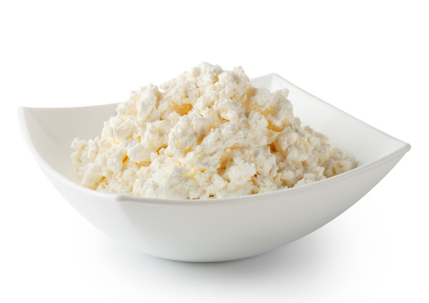 Cottage cheese in white plate - Foto, afbeelding