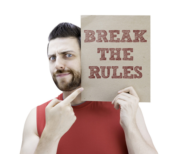 Man holding a card with the text Break The Rules - Φωτογραφία, εικόνα