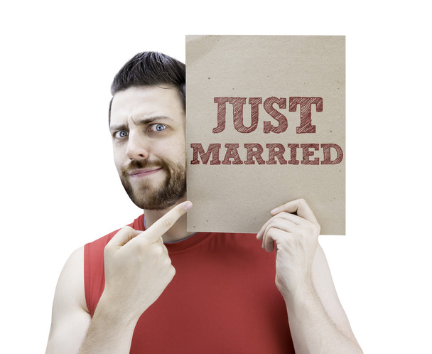 Man holding a card with the text Just Married - Foto, Imagen