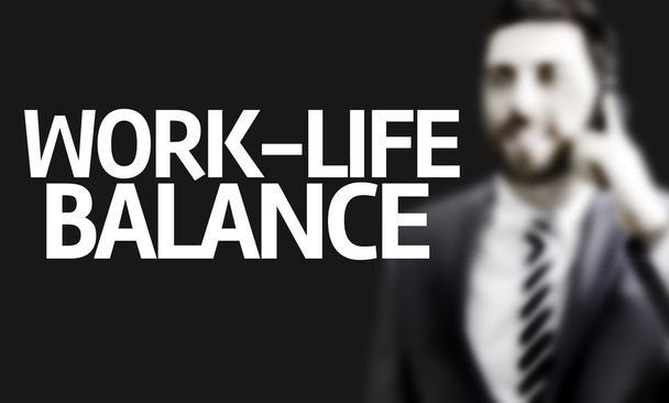 Homem de negócios com o texto Equilíbrio Vida-Trabalho
 - Foto, Imagem