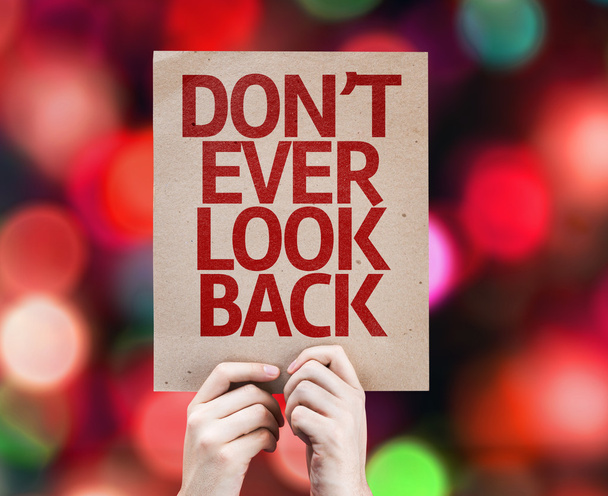 Don't Ever Look Back written on colorful background - Photo, Image