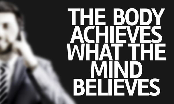 Business man with the text The Body Achieves What the Mind Believes - Photo, Image