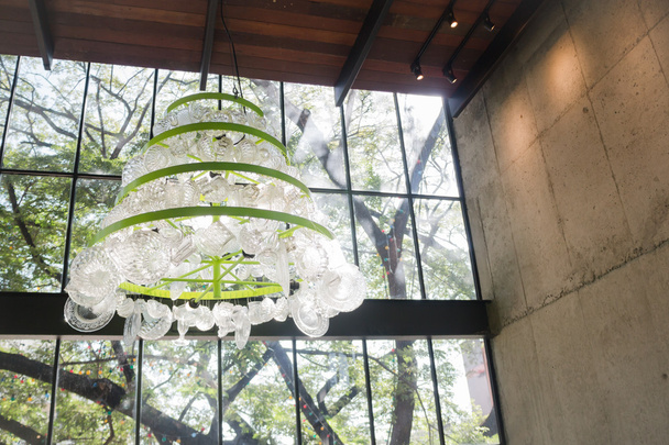 Create glass chandelier hanging from ceiling - Photo, Image