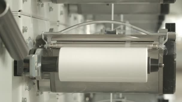 Closeup of polymer thread winding machine in action, slow motion - Video, Çekim