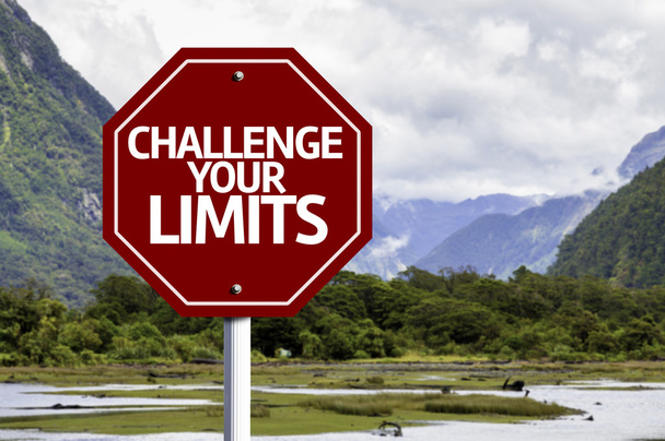 Challenge your Limits written on red road sign - Photo, Image