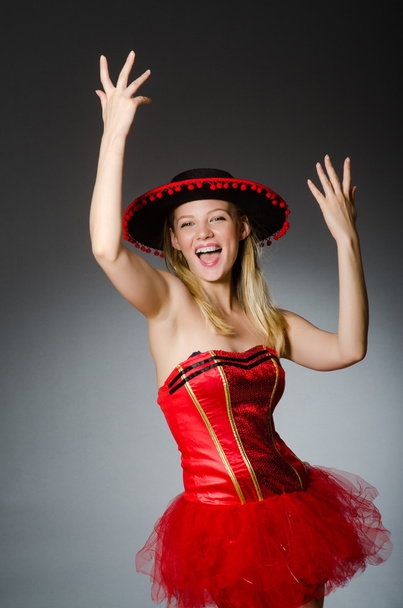 Woman wearing sombrero hat in funny concept - Photo, Image