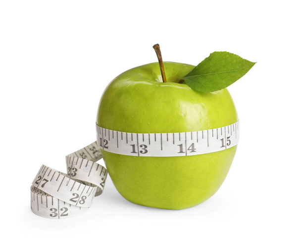 Fresh green apple with measuring tape on white background - Zdjęcie, obraz