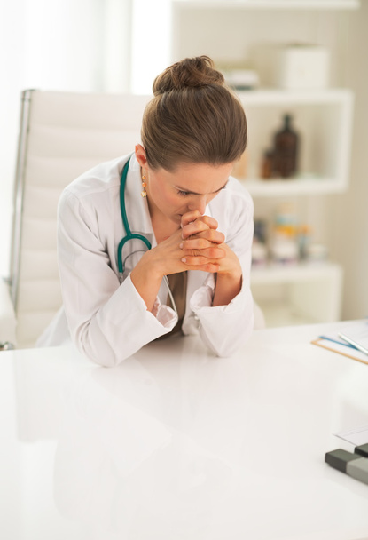 Portrait of frustrated doctor woman in office - 写真・画像