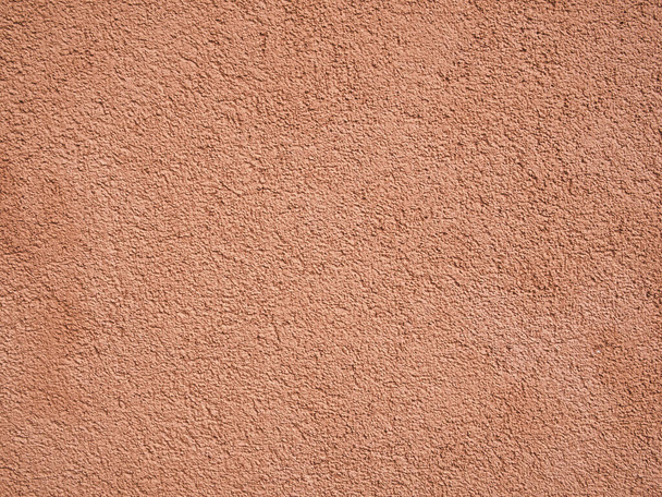 Peach colored rough wall texture - Foto, afbeelding