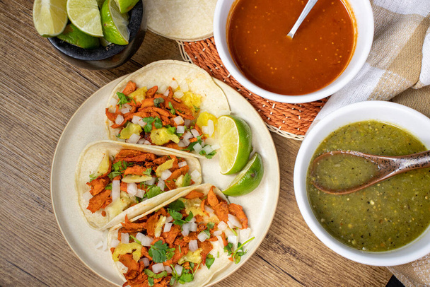 Mexican al pastor street tacos with salsas - 写真・画像