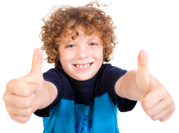 Smilling cute little boy gesturing thumbs up - Photo, Image