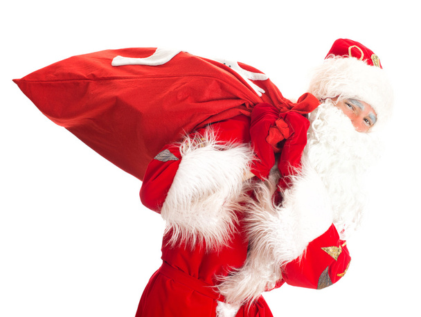 Santa with bag of presents. Isolated on white. - Photo, Image
