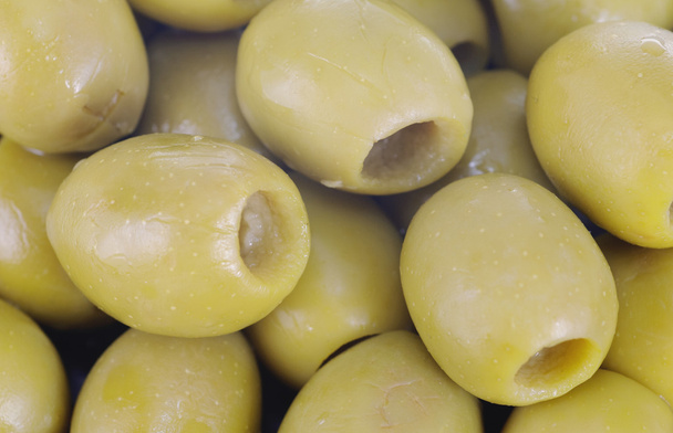 Sfondo astratto: olive denocciolate verdi
. - Foto, immagini