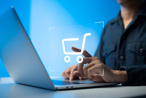shopper using laptop and touch virtual screen online shopping. And online payment option or digital wallet online transaction concept. - Φωτογραφία, εικόνα