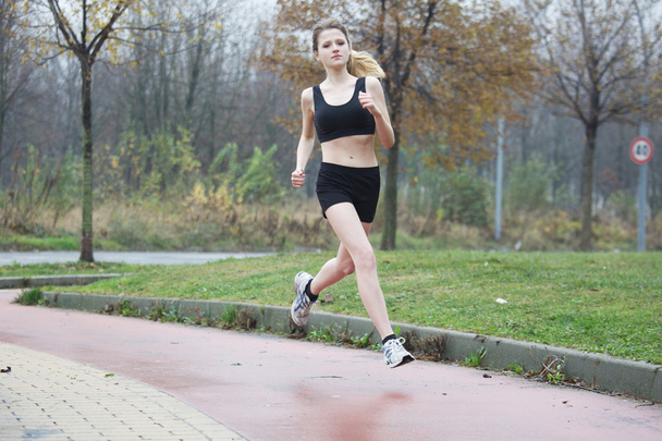 Running woman - Фото, зображення
