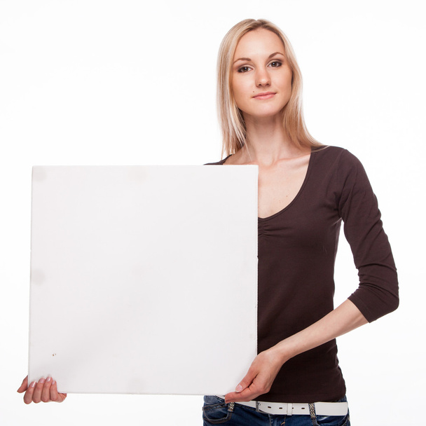 Smiling woman show big blank board - 写真・画像