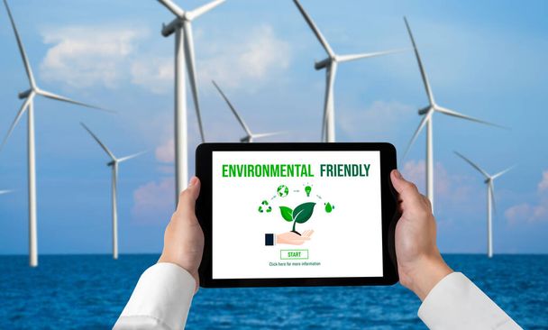 環境保全とESGビジネスコンセプトのためのグリーンビジネス変革。事業者は、タブレットを使用して、環境に優しい管理と代替のクリーンエネルギー使用に向けた企業目標を設定します. - 写真・画像