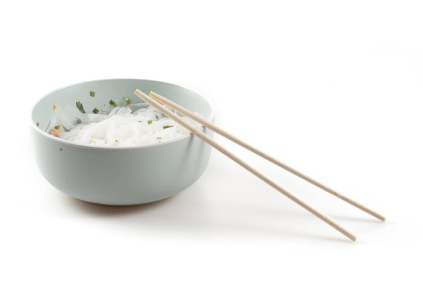 Image of isolated bowl with noodle with sticks - Fotó, kép