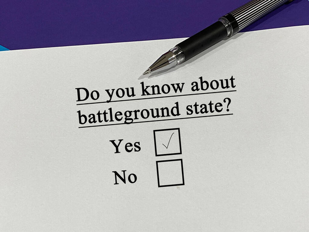 One person is answering question about politics. He knows about battleground state. - Photo, Image