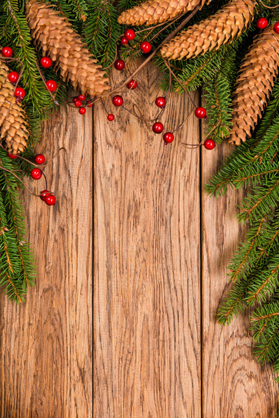 Decorated Christmas fir tree on a wooden board - Fotografie, Obrázek