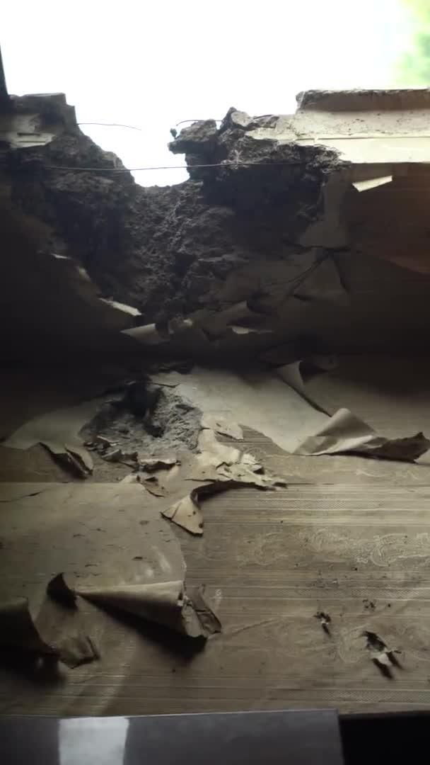 The apartment of the inhabitants after the evacuation during the bombing of a peaceful city. Left belongings of residents. Bombed apartments. Fire in the house. Traces of hits from. Irpin. Ukraine. - Video