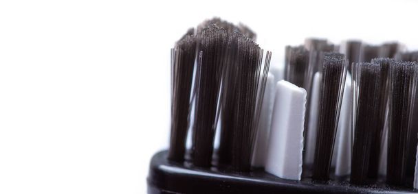 Macro photo of toothbrush isolated on white background. - Foto, Bild