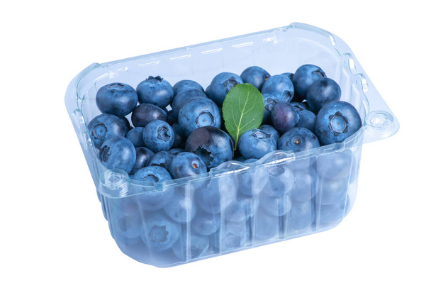 Blueberries in the basket isolate on white background. - 写真・画像