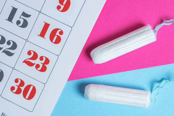 Woman hygiene protection, menstruation calendar and clean cotton tampons - Zdjęcie, obraz