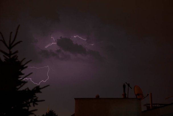 Thunderstorm lightning with dark cloudy sky - Fotoğraf, Görsel