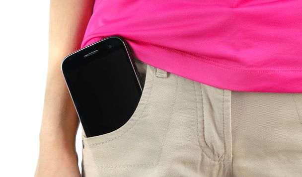 Smart phone in pocket jeans close-up - Фото, изображение