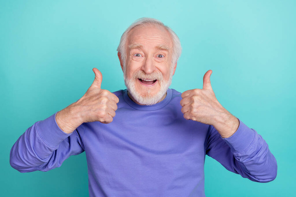 Portrait of cheerful glad aged man hands fingers demonstrate thumb up approve isolated on teal color background. - Φωτογραφία, εικόνα