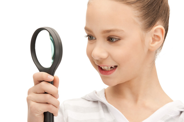 Teenage girl with magnifying glass - Φωτογραφία, εικόνα