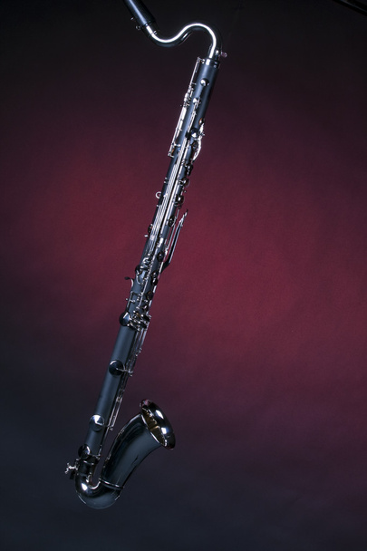 Bass Clarinet Isolated On Red Spotlight - Photo, Image