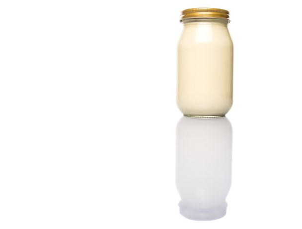 Mayonnaise in a jar over white background - Foto, imagen