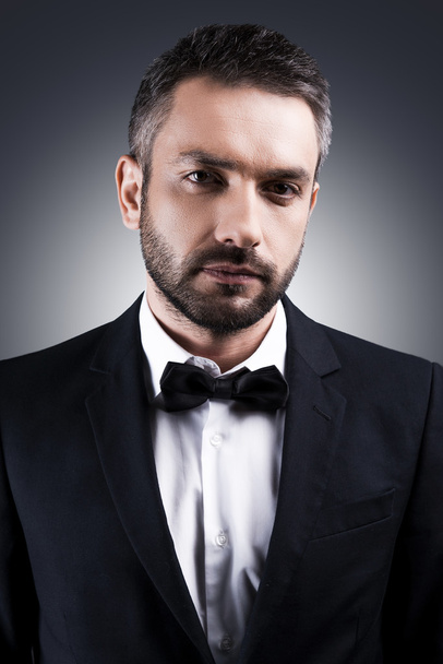 Mature man in formalwear and bow tie - 写真・画像