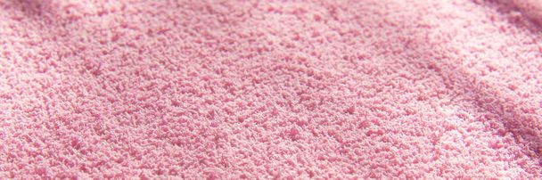 Light pink soft, fluffy, light blanket. Texture cotton textile background. Banner - 写真・画像