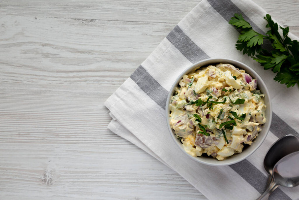 Homemade Healthy Potato Salad with Eggs in a Bowl, top view. Flat lay, overhead, from above. Space for text. - Valokuva, kuva