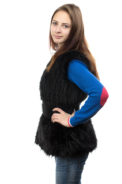 Image of the young woman in fake fur waistcoat - Foto, imagen