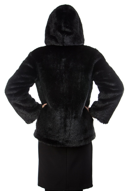 Imagen de la mujer en abrigo de piel con capucha de espalda
 - Foto, imagen