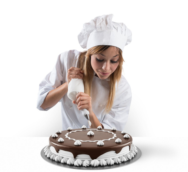 Pastelero prepara pastel
 - Foto, imagen