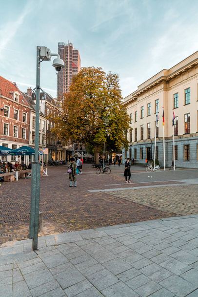 Utrecht, NL - OCT 9, 2021: Street view and traditional Dutch buildings in the historic center of Utrecht city - capital and most populous city of the province of Utrecht, NL. - 写真・画像