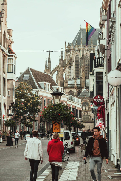 Utrecht, NL - OCT 9, 2021: Street view and traditional Dutch buildings in the historic center of Utrecht city - capital and most populous city of the province of Utrecht, NL. - 写真・画像