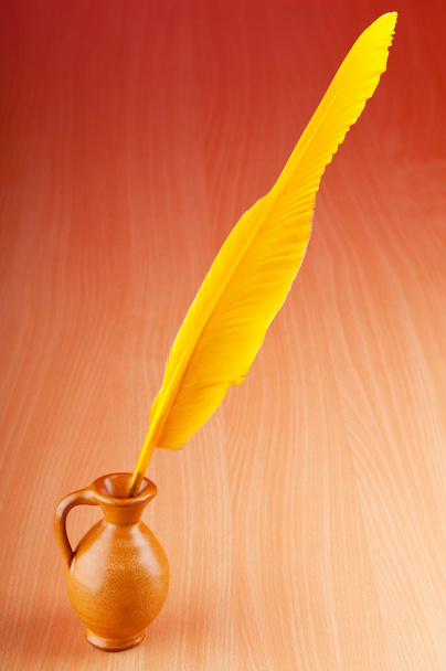 Writing feather against gradient background - Photo, Image